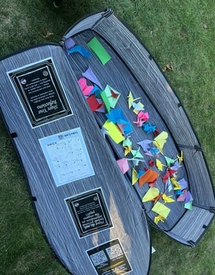 Cover image for LGBTQ Student Groups Host Funeral To Mourn QuOffice Closure