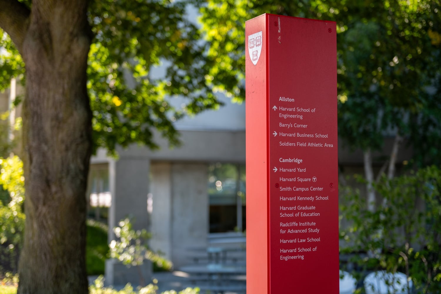 A marker in Allston with the names of various Harvard facilities that neighborhood residents previously had access to as a part of the University's community benefits program.