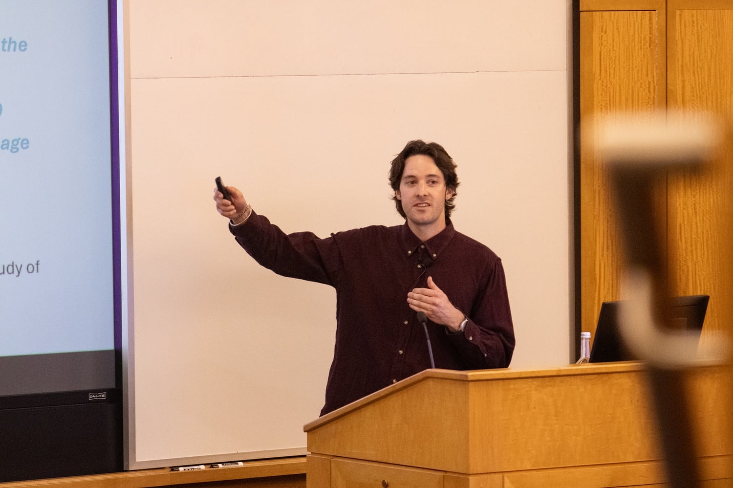 Micah Kaats, a doctoral student in Public Policy at the Harvard Kennedy School, speaks at a talk hosted by Harvard University Dining Services.