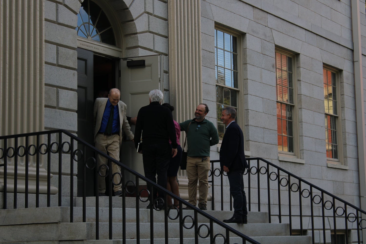 Professors enter University Hall for a meeting of the Faculty of Arts and Sciences.