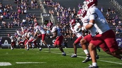 Cover image for In Photos: Harvard Football Takes Down Holy Cross