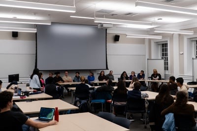 Cover image for City Council Candidates Weigh In Against Trump Settlement at Harvard Dems Forum