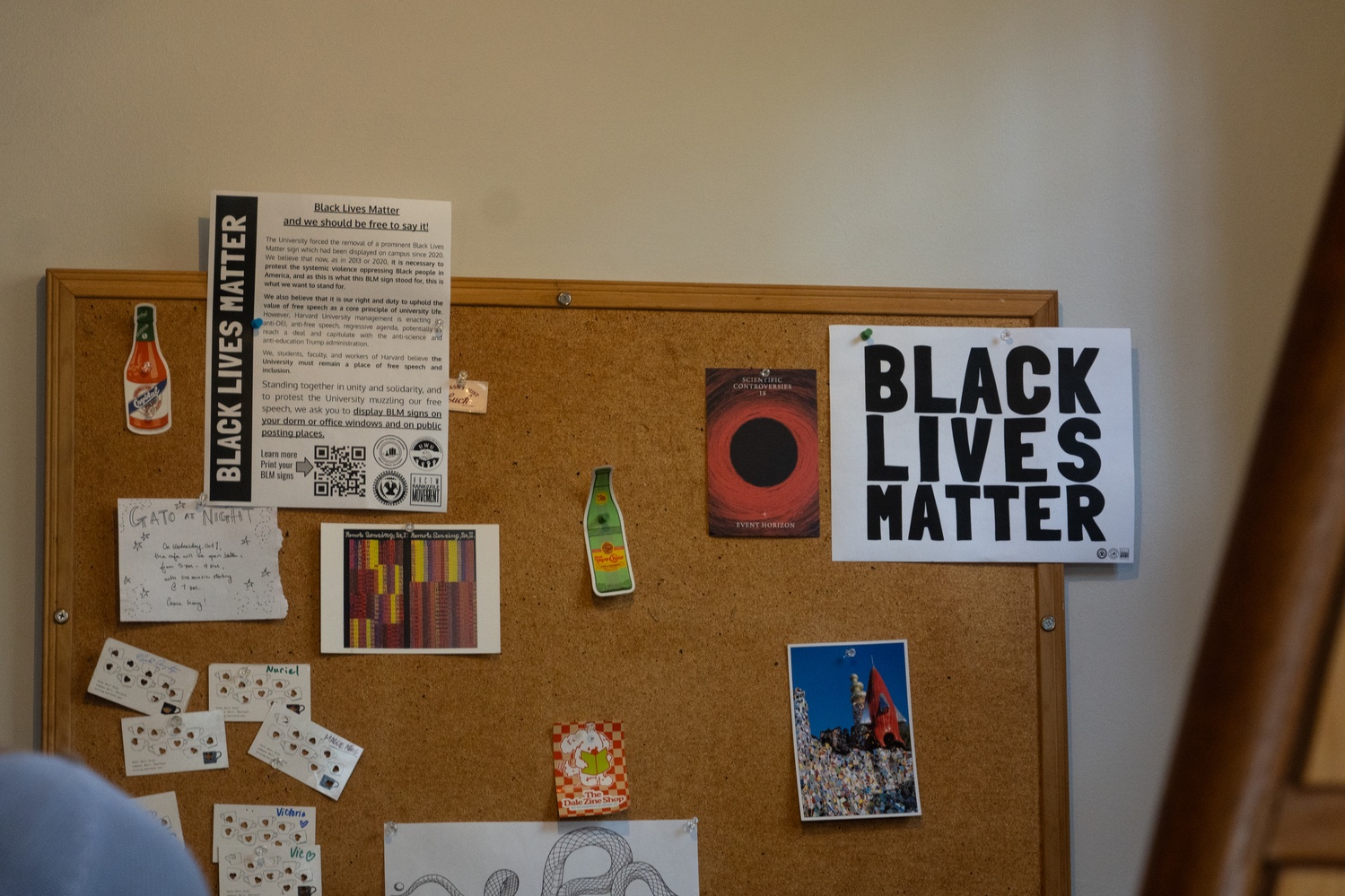 Black Lives Matter posters put up by three Harvard unions, on a bulletin board in Café Gato Rojo.