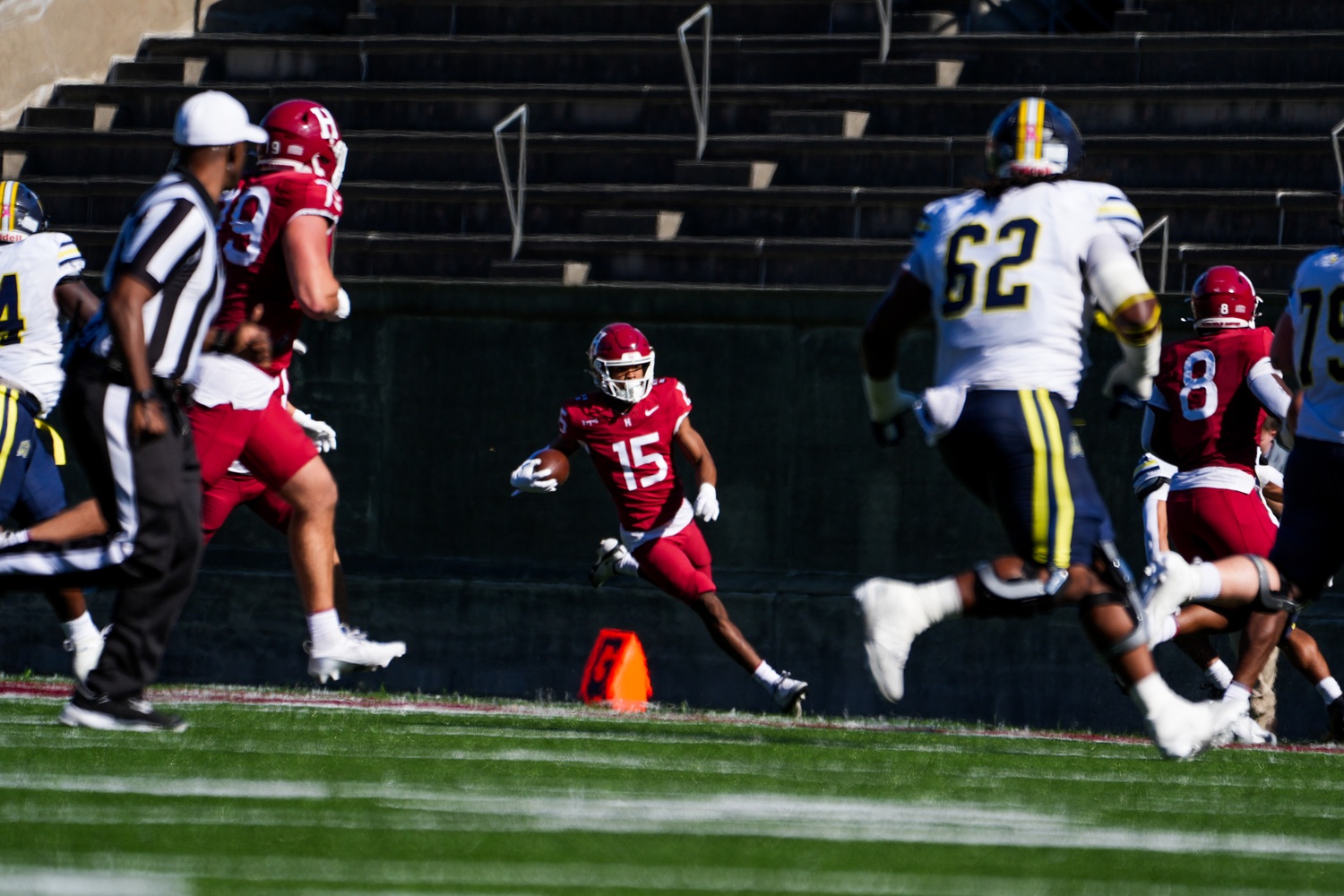 Sophomore Xaden Benson runs with an interception as the first half ends.