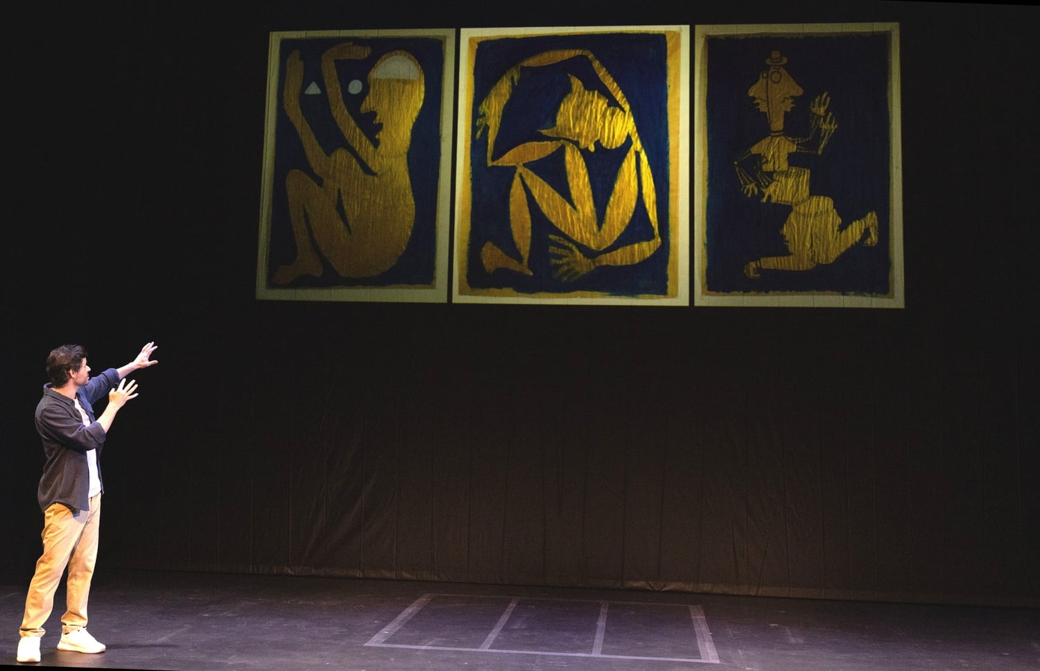 Sam Kissajukian in performance of "300 Paintings" at A.R.T.