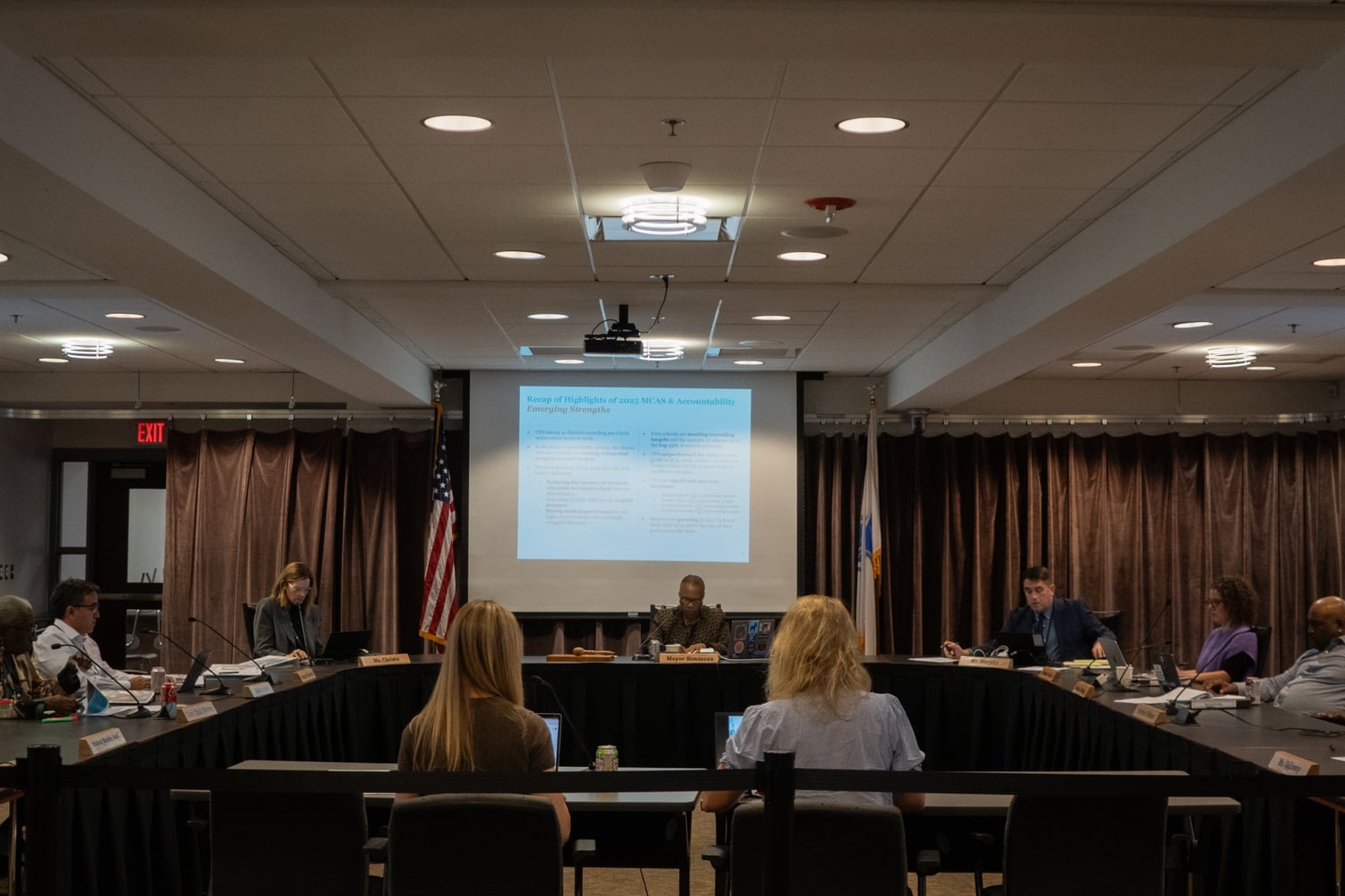 The Cambridge School Committee reviews MCAS results at a 2025 meeting. Committee members pressed district officials Tuesday to establish measurable goals for closing persistent racial and socioeconomic achievement gaps.