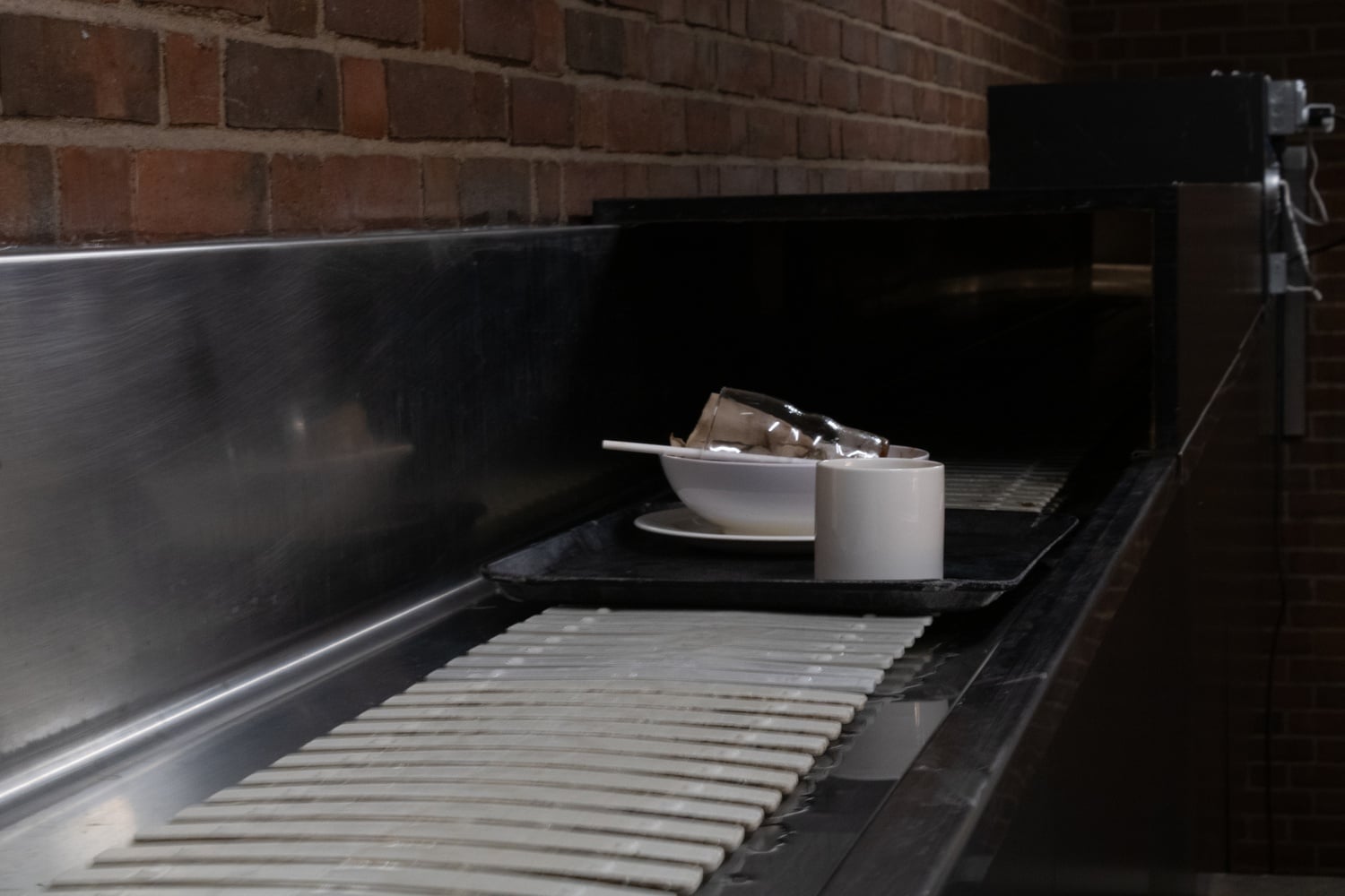 A machine was installed on the dish return at Mather House's dining hall to measure food waste.