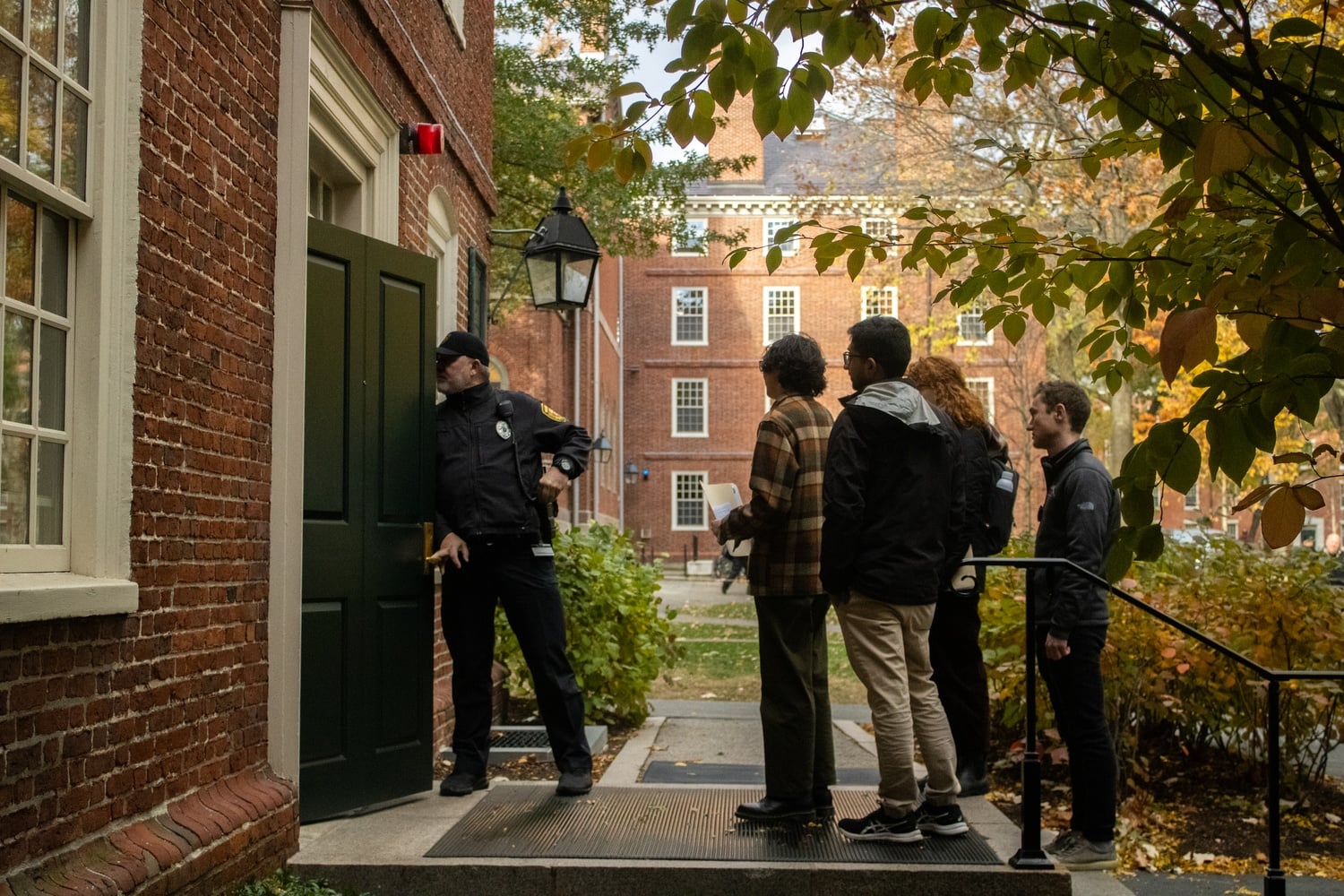 Leaders of the Harvard Academic Workers union deliver a petition demanding a contract, to Harvard Administration officials.​​​​​​