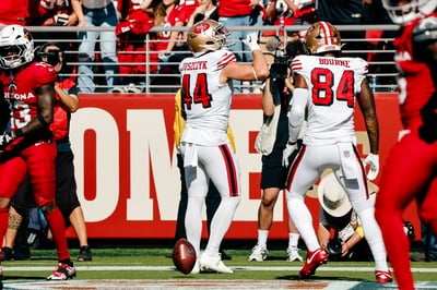 Cover image for Kyle Juszczyk '13 Celebrates With Teammate Kendrick Bourne