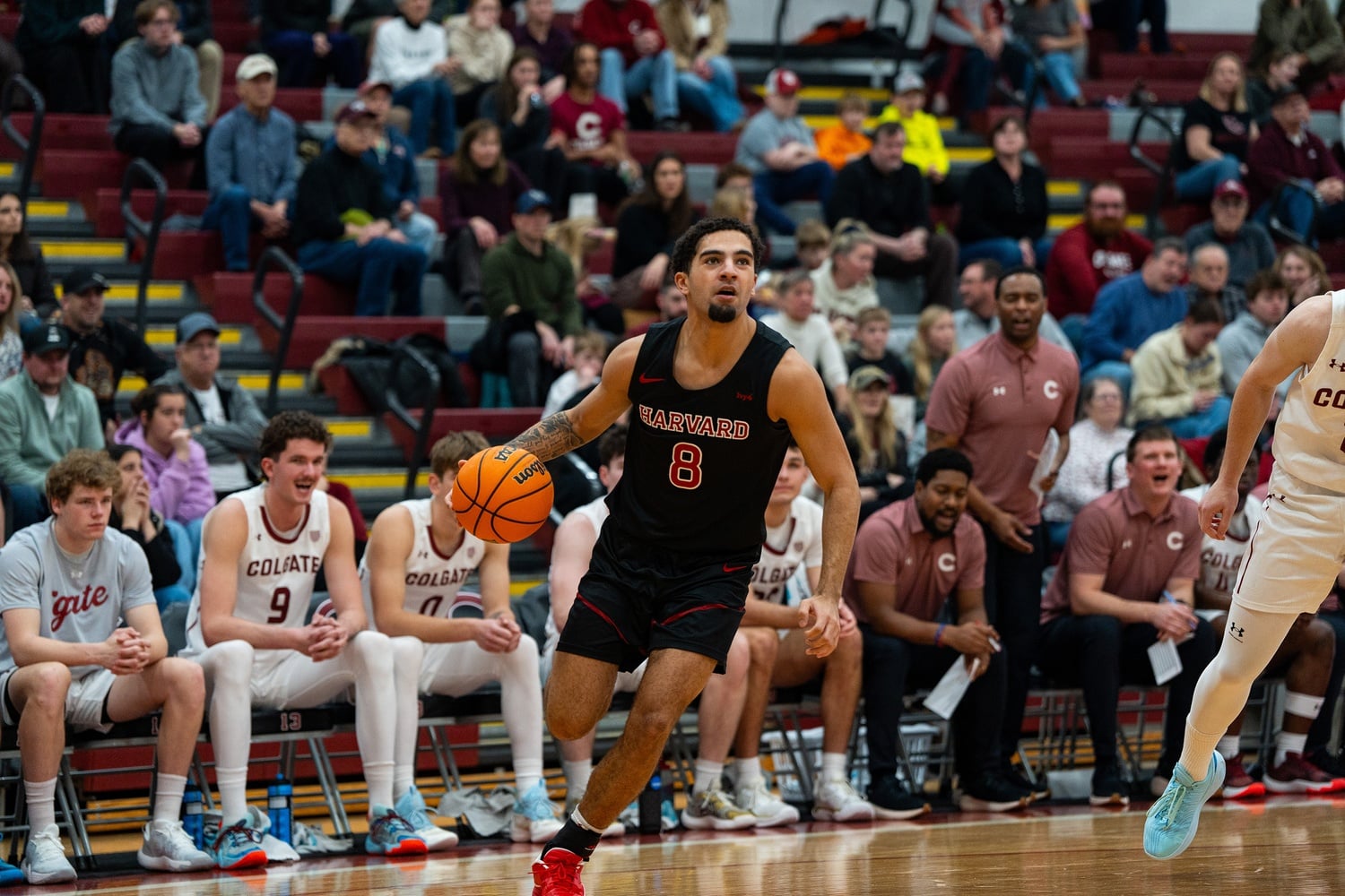 Tey Barbour drives with the ball during the game against Colgate. The sophomore guard scored 18 points against the Raiders. 