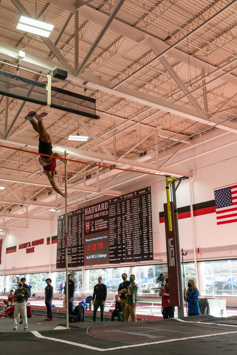 A Harvard pole vaulter competes at the indoor track and field meet on Saturday, Dec. 4, 2021. This year, sophomore Ella McRitchie and junior Lilly Hodge both placed in the top three of the women’s pole vault.
