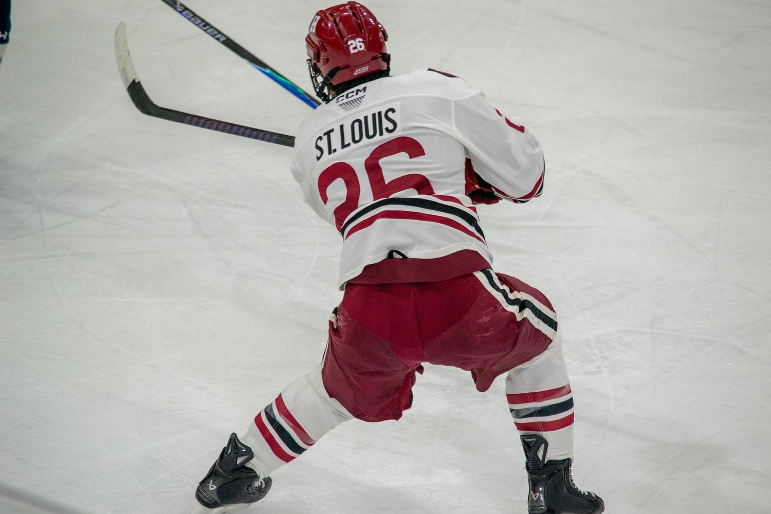 Lucas St. Louis rips a shot during a game against Yale earlier this season.