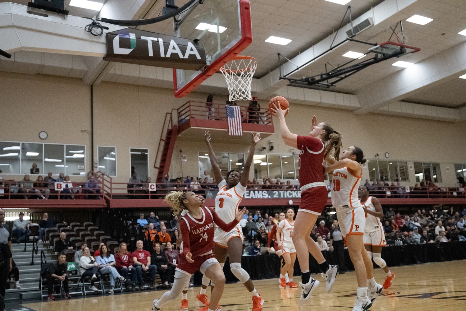 Then-sophomore Abigail Wright drives to the rim against Princeton during a game last season. This year, Harvard took the No. 20 Tigers to overtime.