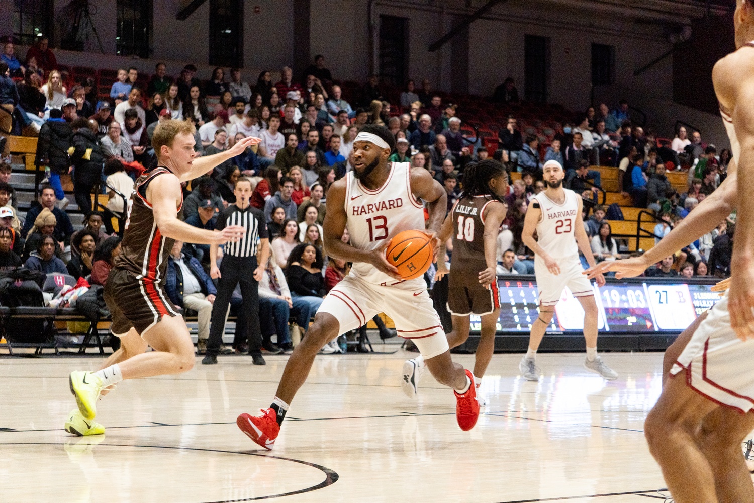 Chandler Piggé drives to the net during the men's basketball team's game against Brown last season. This year, Piggé, a Crimson Sports Writer, scored 16 points in the Crimson's win over the Bears.