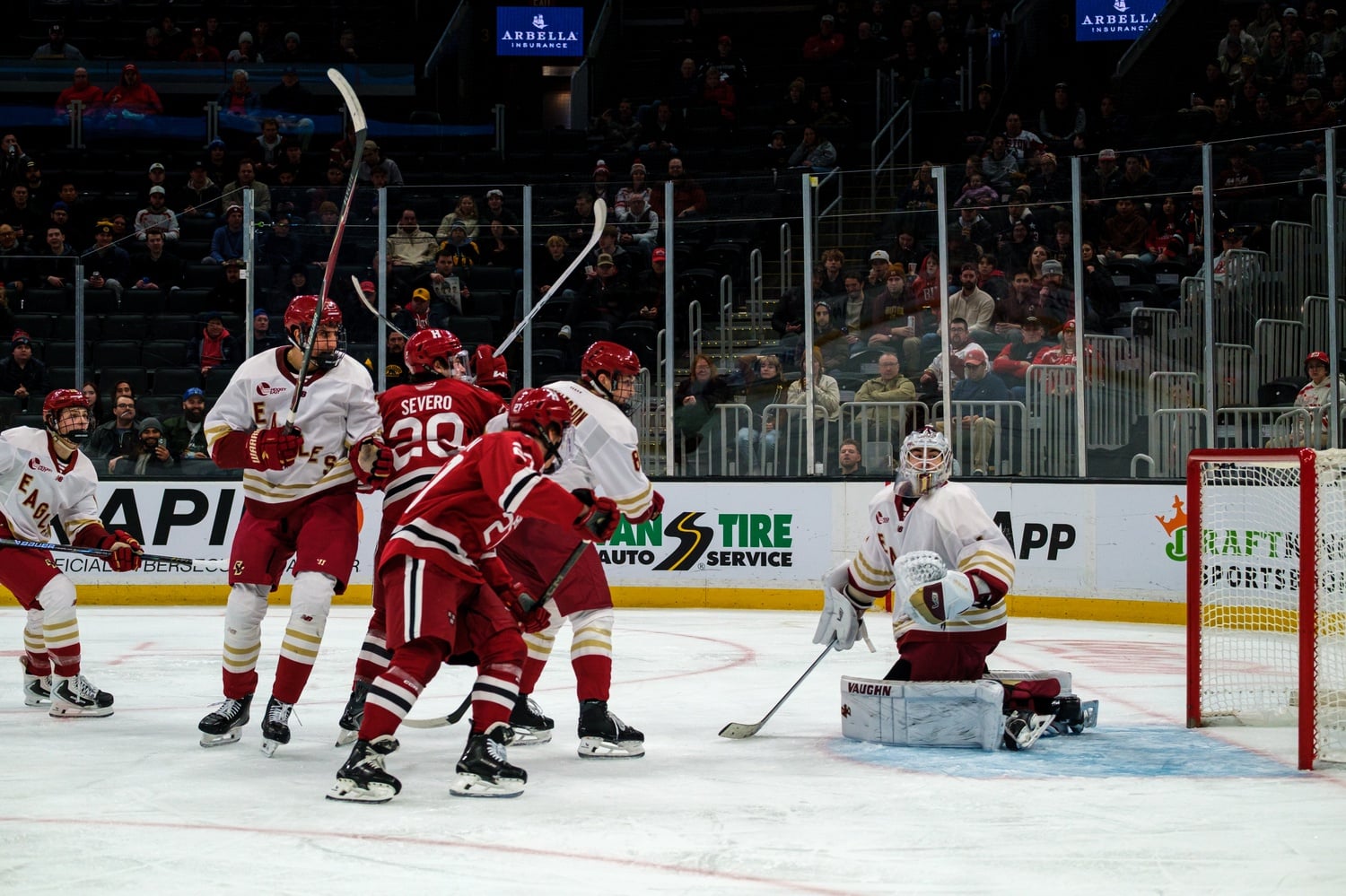 Senior Casey Severo and sophomore Mick Thompson put pressure on the Eagles during the 73rd Beanpot. 