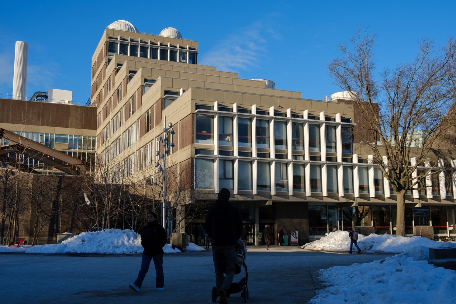 Many academic buildings have remained open after the FAS said it would require Harvard ID swipe this semester.