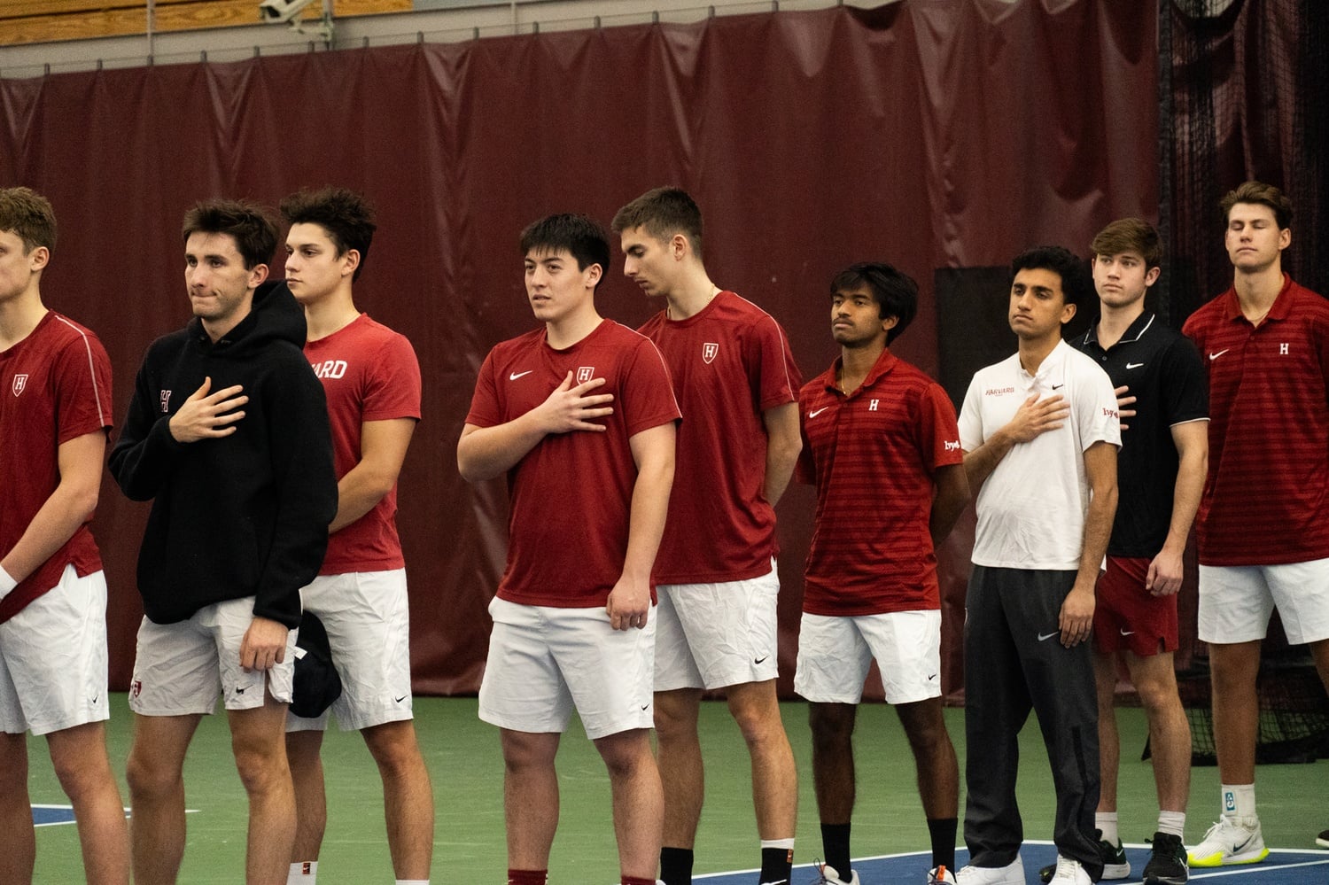 The Harvard men's tennis team lined up for the national anthem before a match against Middle Tennessee last season.