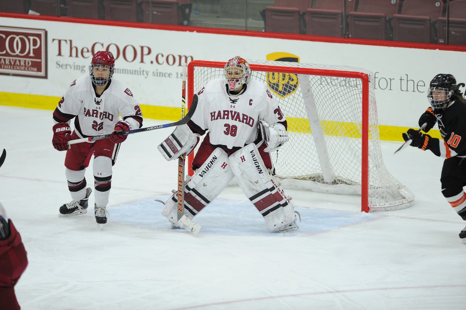 Emerance Maschmeyer '16 guards the net against the Princeton Tigers. 