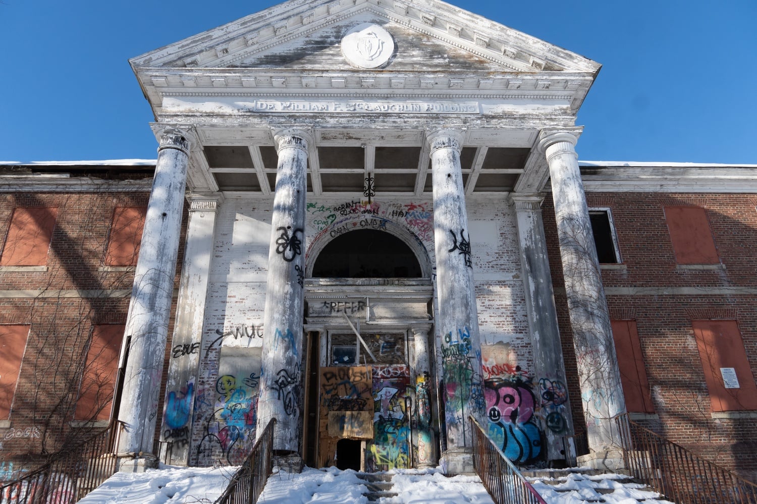 The Metropolitan State Hospital, located in Waltham, was closed in 1992. Now, only this administrative office remains — covered in graffiti and falling into disrepair. Yakovlev worked as their director of laboratories from 1936 to 1938.