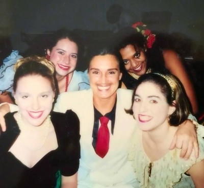 Cover image for For the Cabot Musical rendition of Grease, there was a shortage of boys so Bela volunteered. She is in the white tuxedo. “That painted mustache went everywhere with me,” she writes.