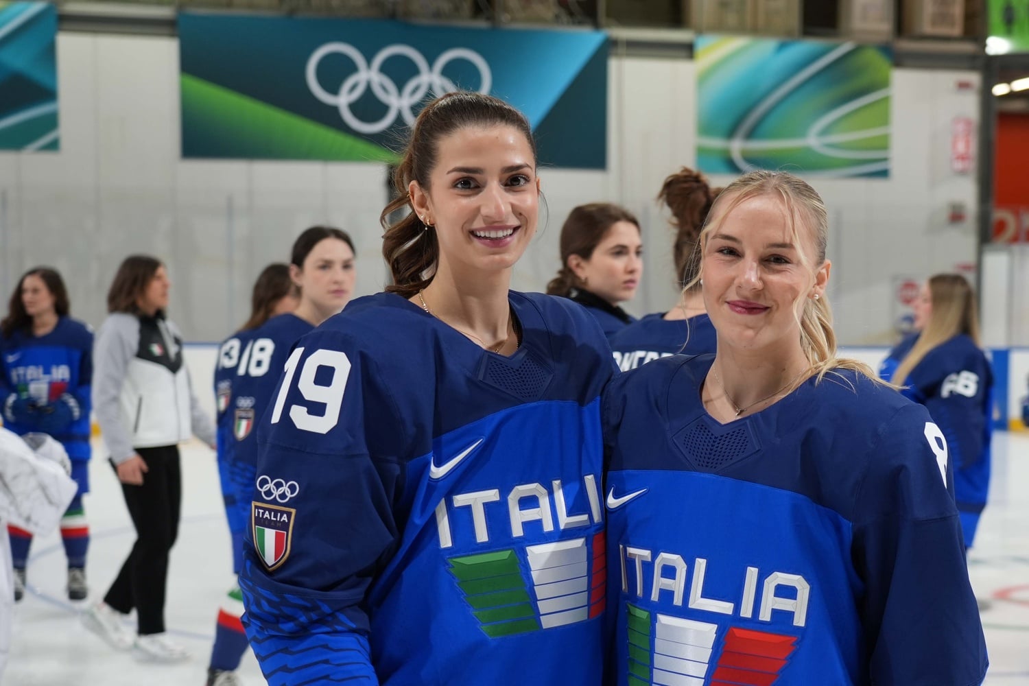 Kristin Della Rovere ’23 and teammate Anna Caumo in their Team Italy jerseys for the 2026 Milano-Cortina Olympic Games.
