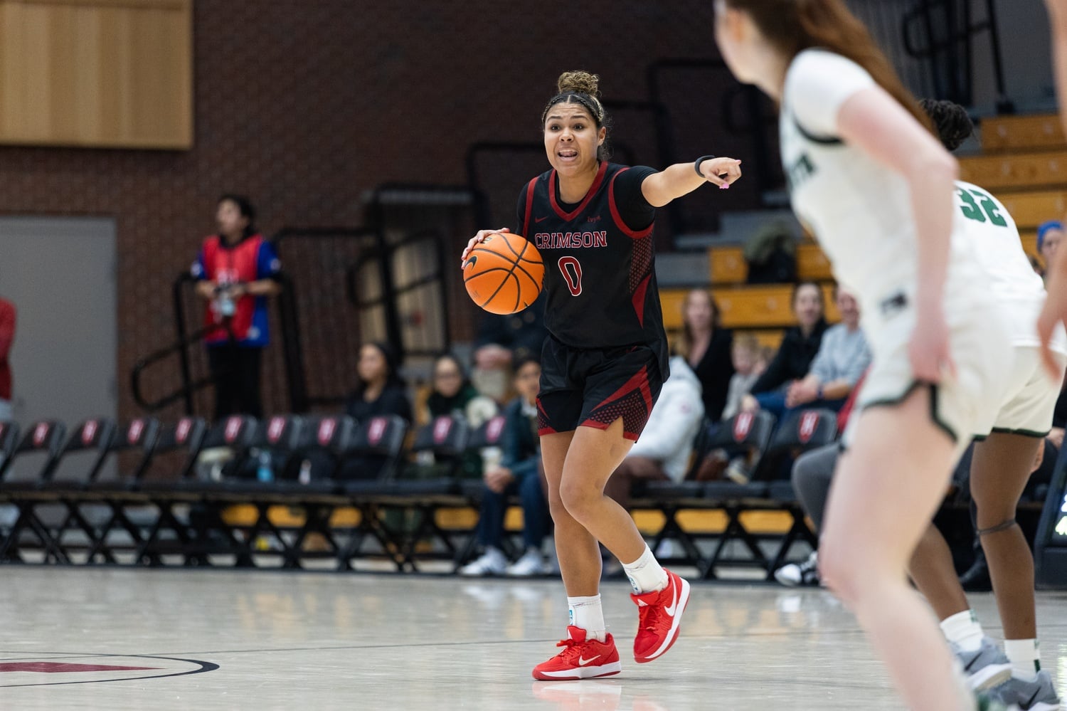 Freshman guard Olivia Jones directs traffic for the Crimson.