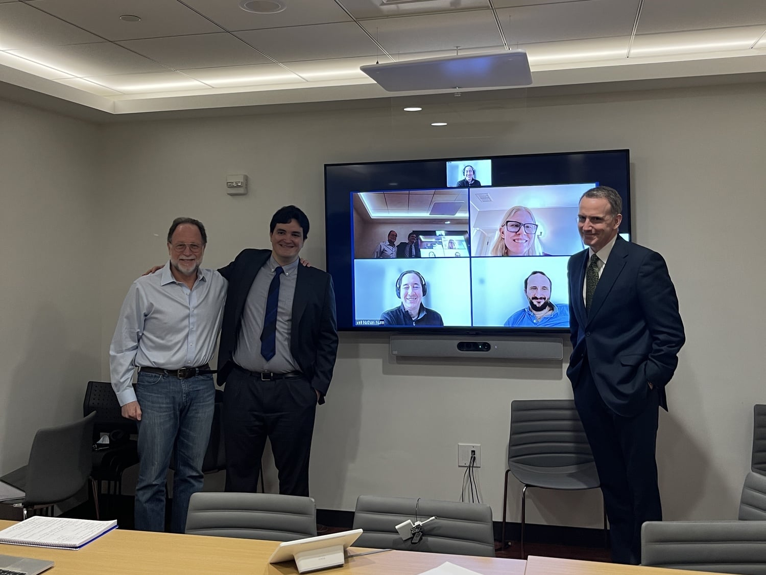 Jose R. Morales-Arilla at his PhD dissertation defense in 2022, standing beside Ricardo Hausmann.