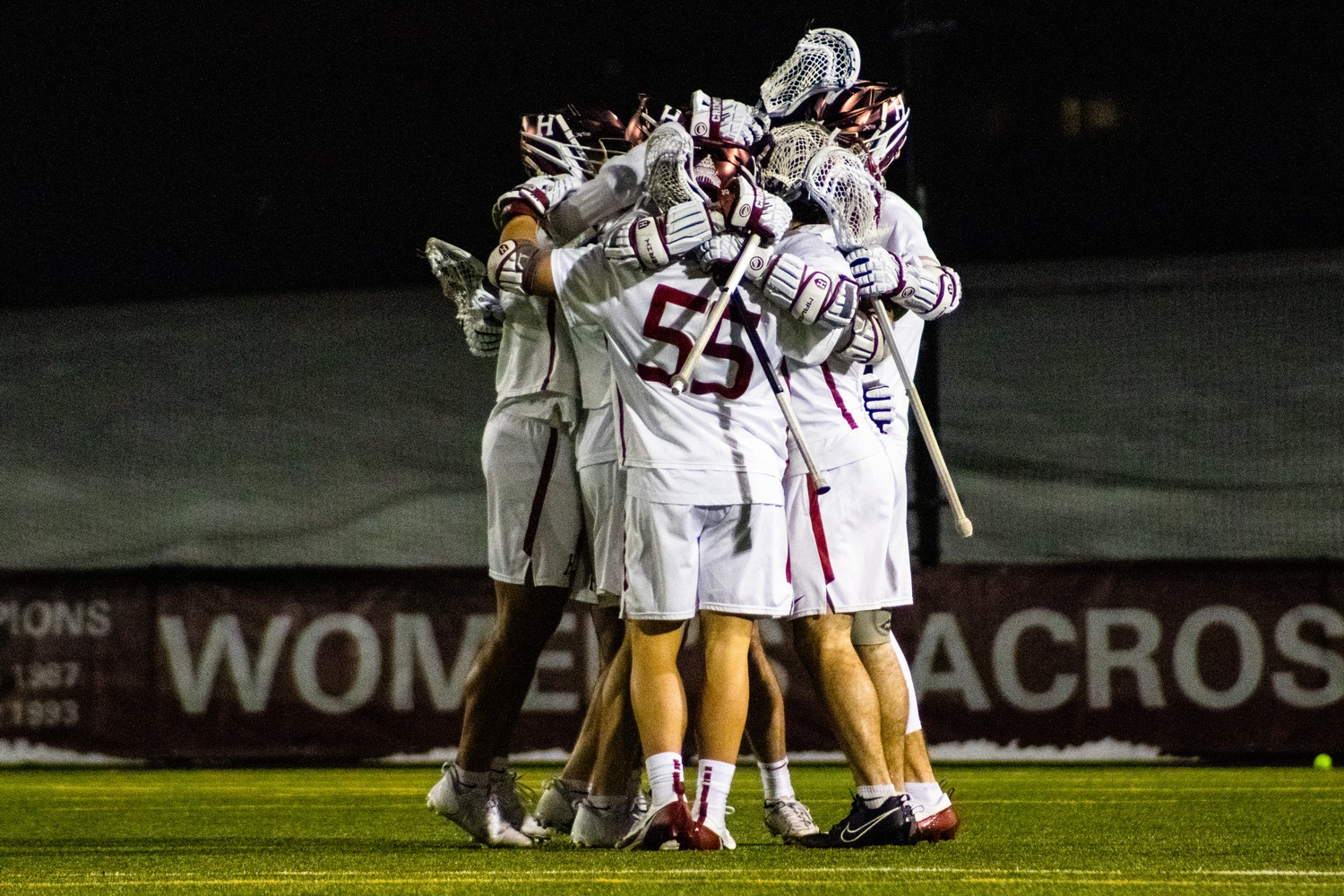 Harvard men's lacrosse celebrates its win over the Colgate Raiders earlier this season. The Crimson upset No. 1 Syracuse on Jordan Field today.