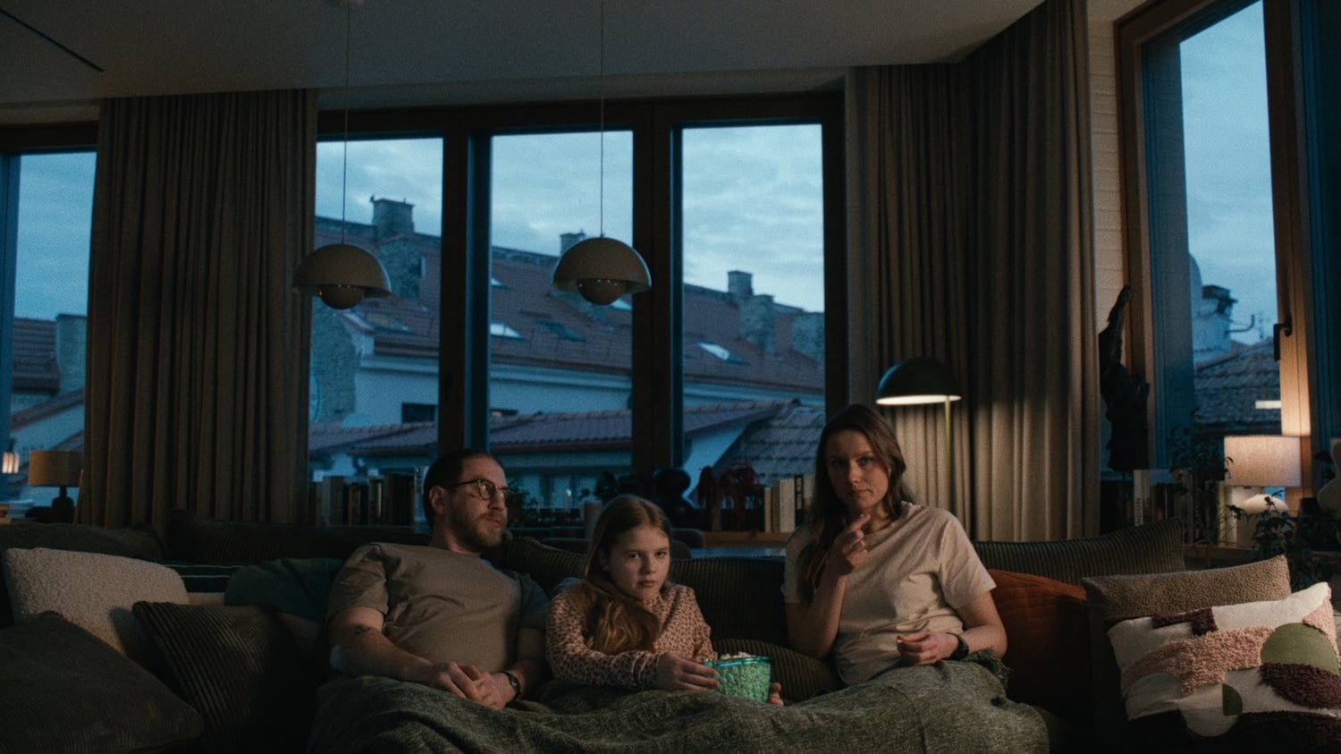 Marius Repsys, Amelija Adomaityte, and Zygimante Jakstaite in "How to Divorce During the War," an official selection of the 2026 Sundance Film Festival.