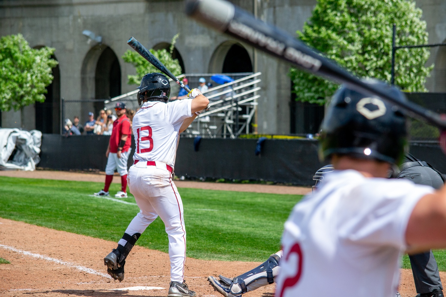 Senior infielder Jordan Kang at bat for the Crimson.