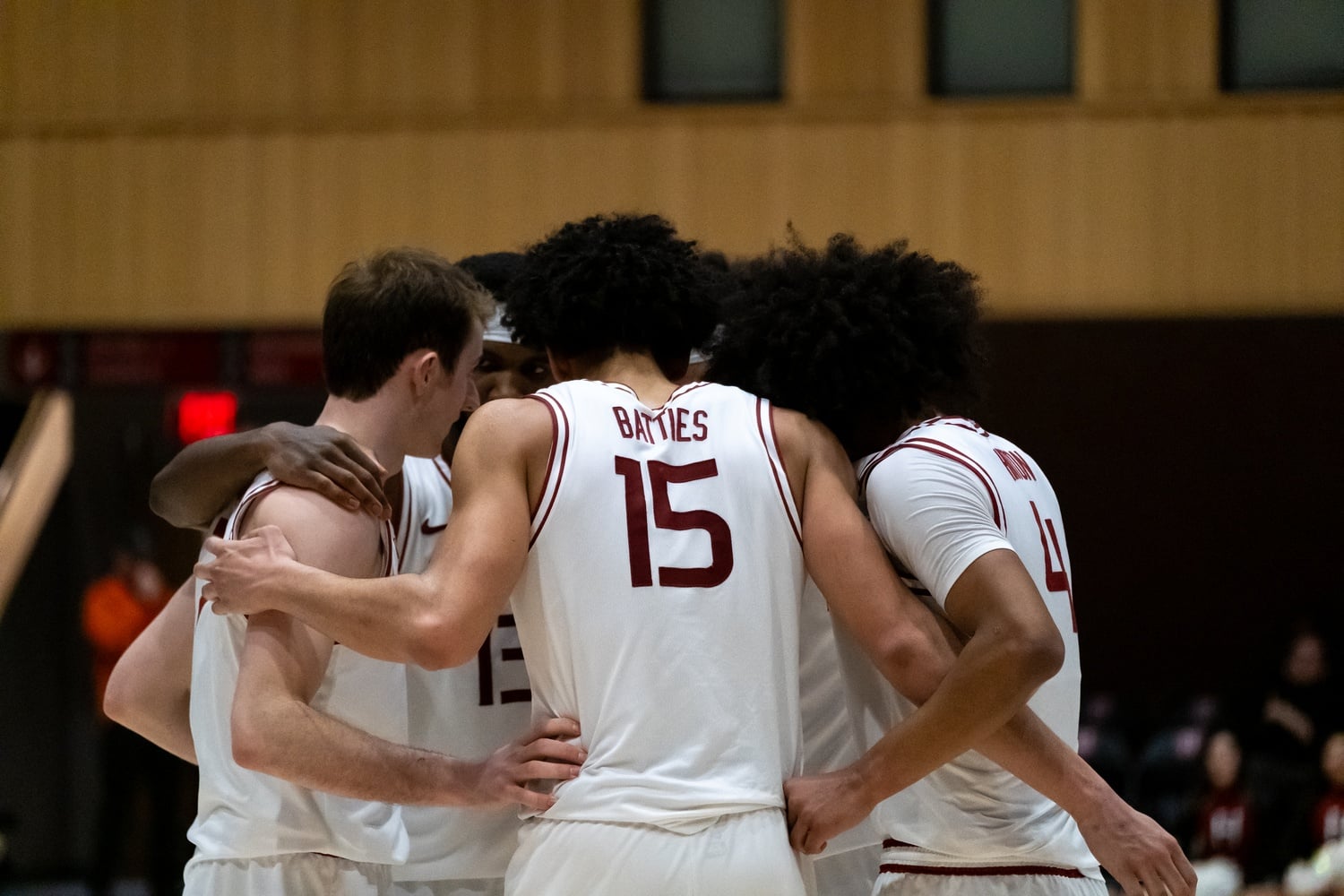 The Harvard team huddles after playing Cornell last season. The Crimson fell to Penn in overtime in the Ivy League semifinals today in Ithaca, N.Y.