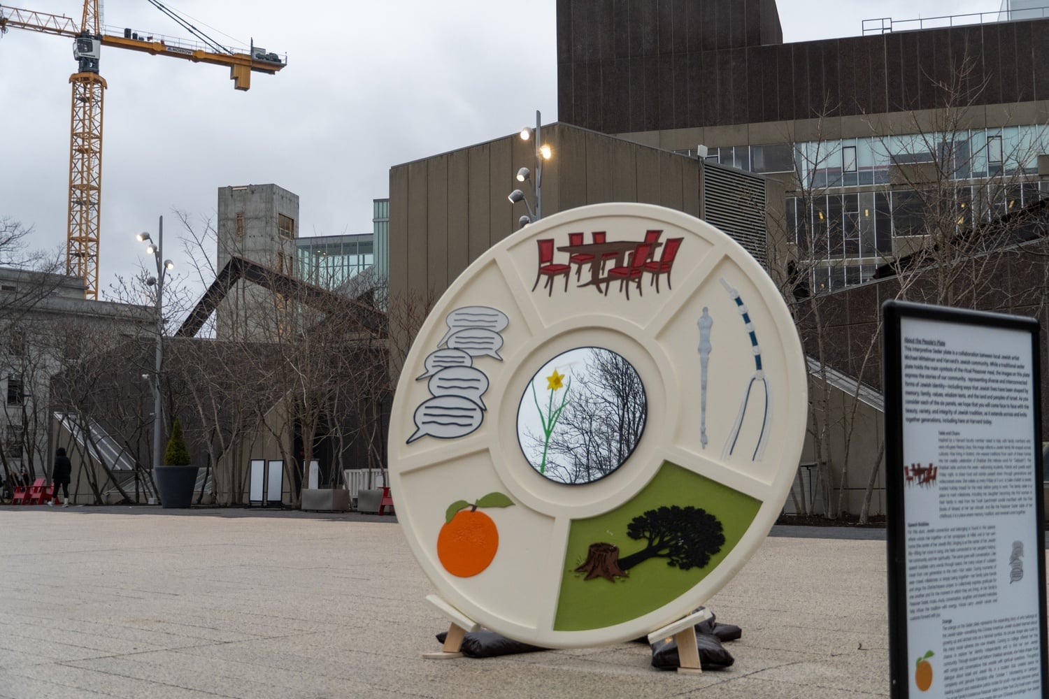 A crowd of roughly 40 gathered at Harvard Hillel's new art installation, located in the Science Center Plaza, on Monday. The art installation will be on display until Thursday.