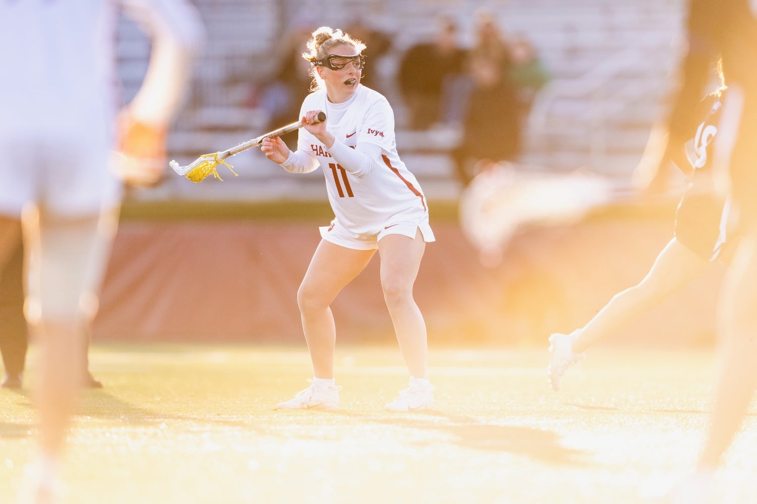 Junior attacker Callie Batchelder rips a free-position shot during her nine-point performance against the Holy Cross Crusaders.