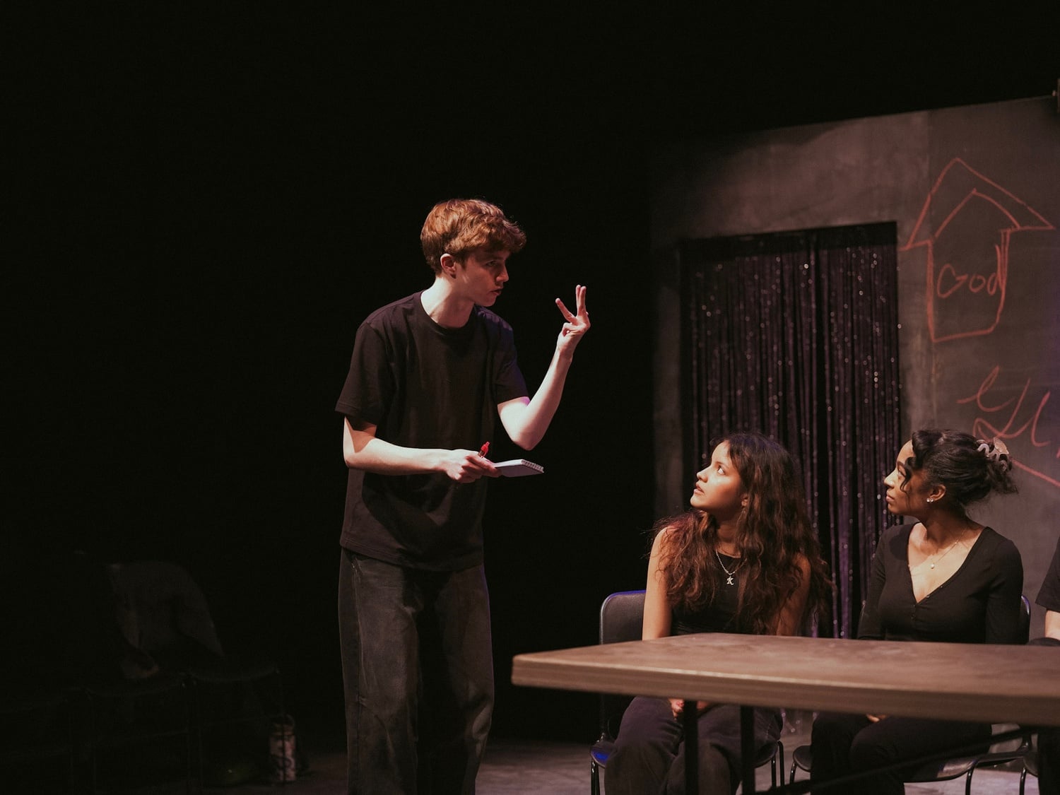 Ames K. McNamara '28 performing in HRDC's production, Sketch.