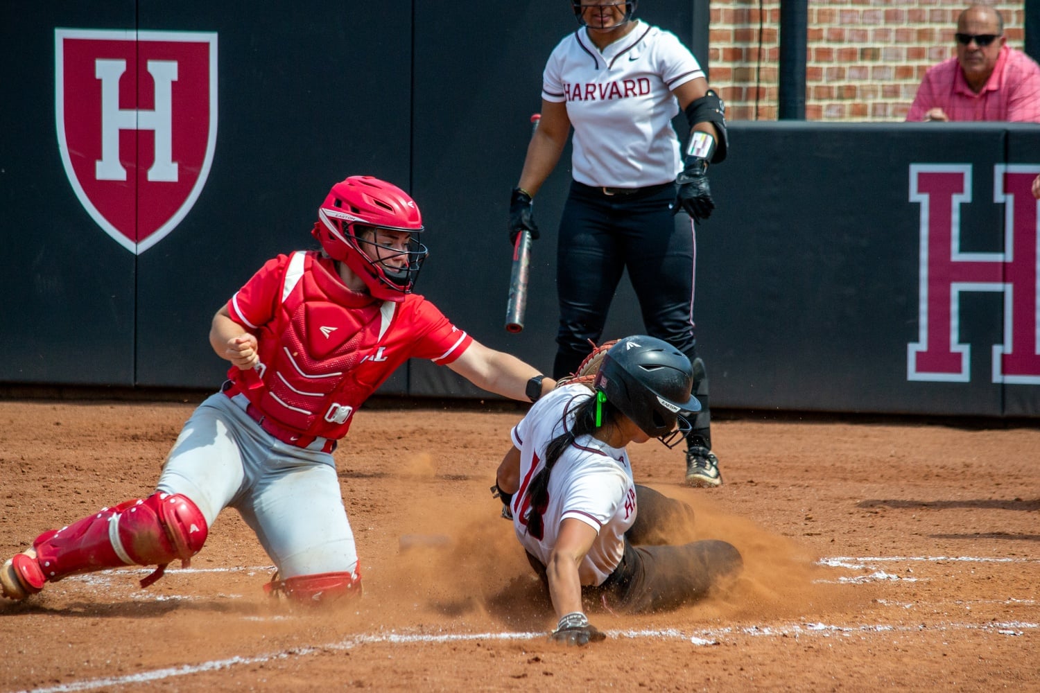 Junior Sophie Sun slides into base