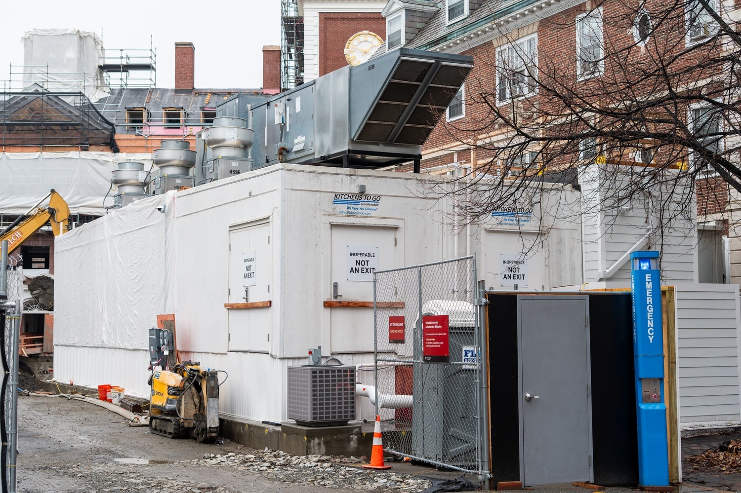 Kirkland House dining staff have prepared meals in a temporary trailer parked outside the dining hall during Eliot House's renovation.
