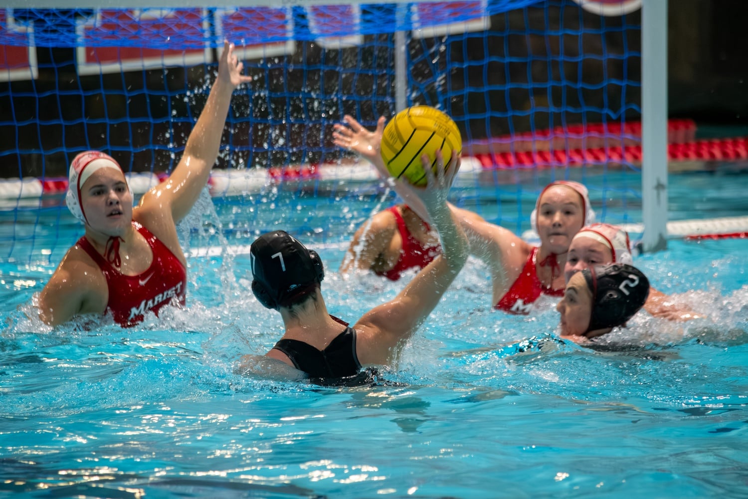 Senior utility Ella Schneider rips a shot during a game against Marist earlier this season.