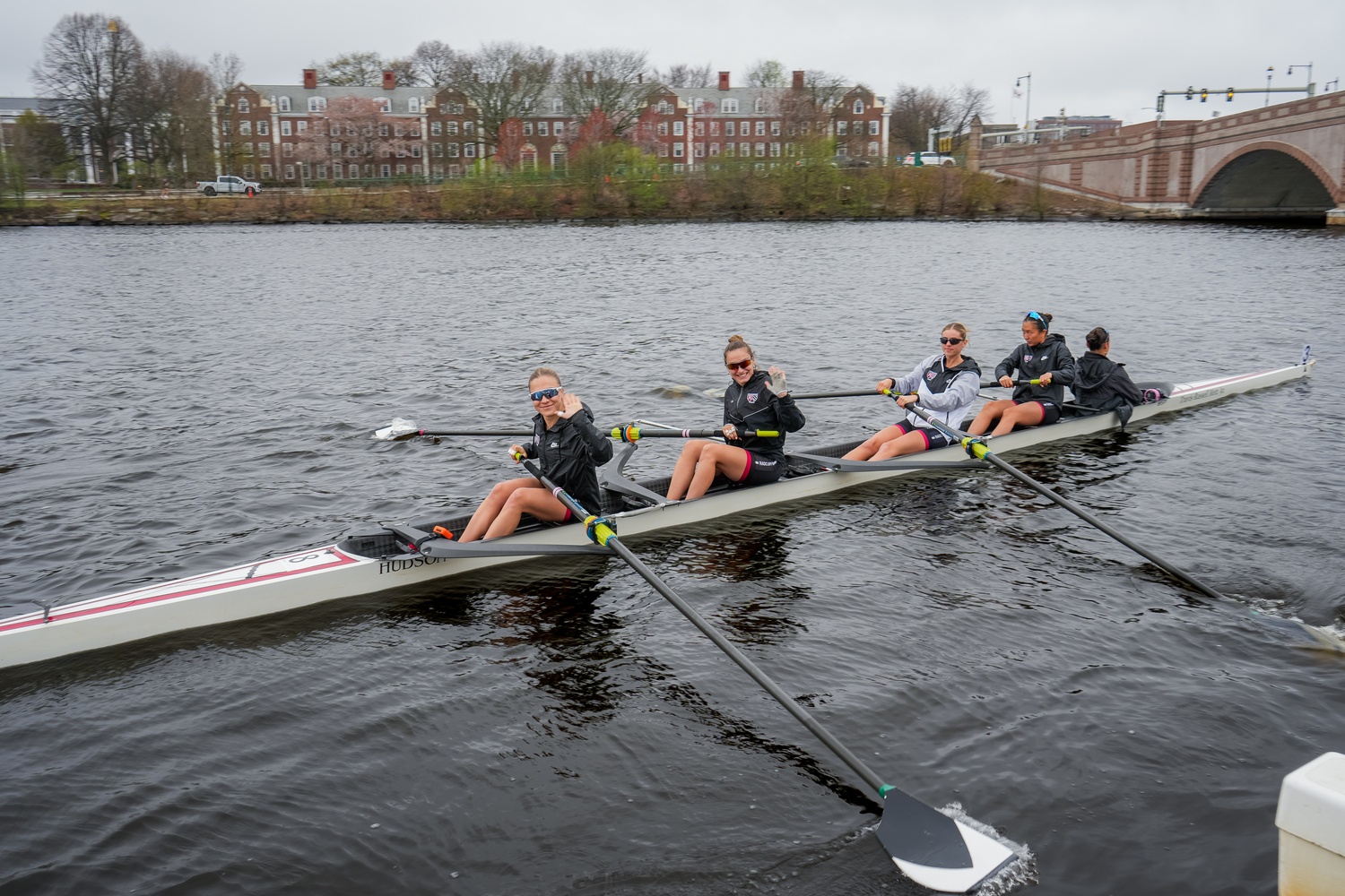 The Harvard-Radcliffe lightweight crew team heads out on The Charles.