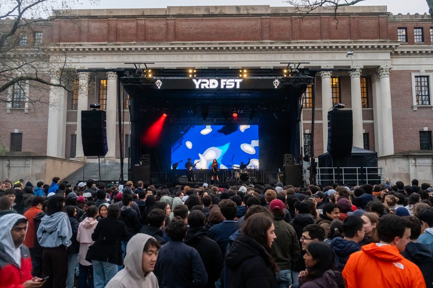 Students attend Yardfest, Harvard College's annual outdoor spring concert, on Sunday.
