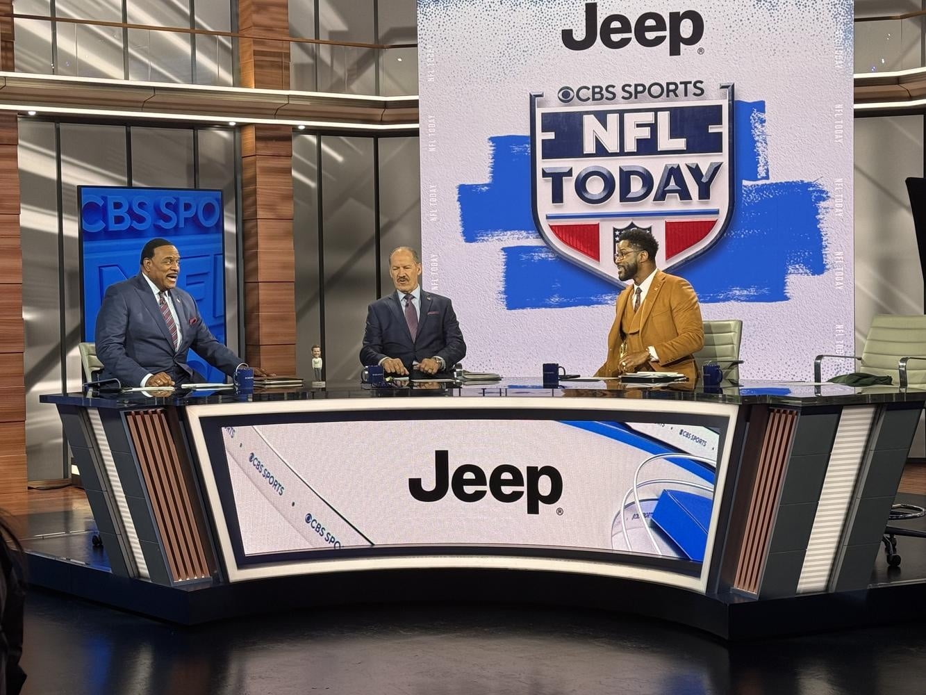 James Brown '73 hosts CBS's NFL Today alongside analysts Bill Cowher and Nate Burleson.