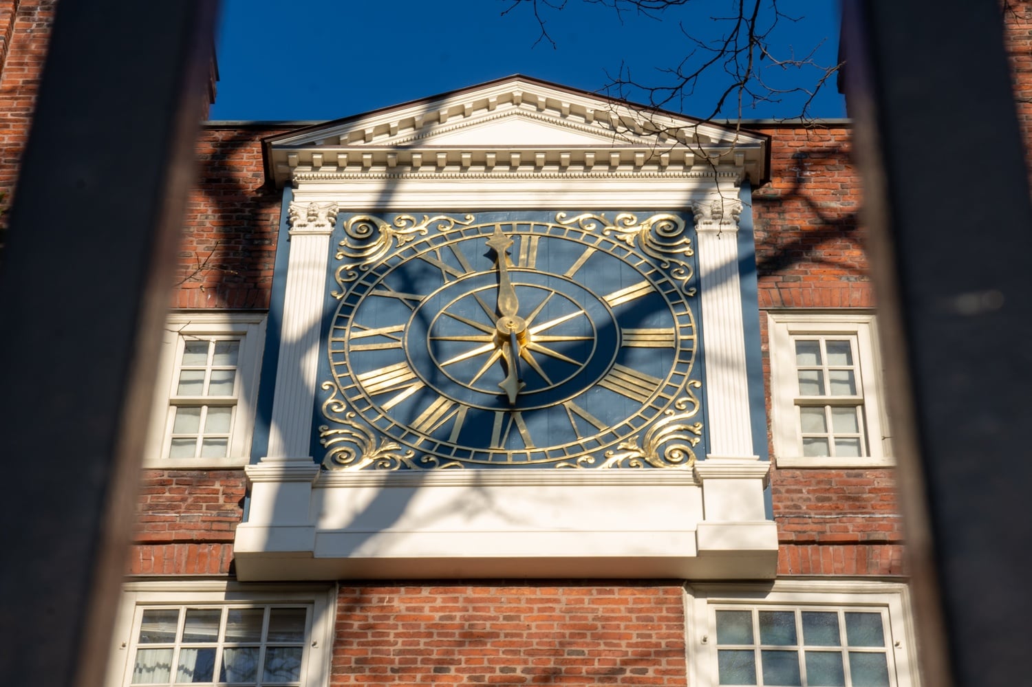 The clock on Massachusetts Hall, pictured in Harvard Yard. As the University's fight with Washington has intensified, Harvard's top administrators have turned increasingly toward lobbying and legal strategy.