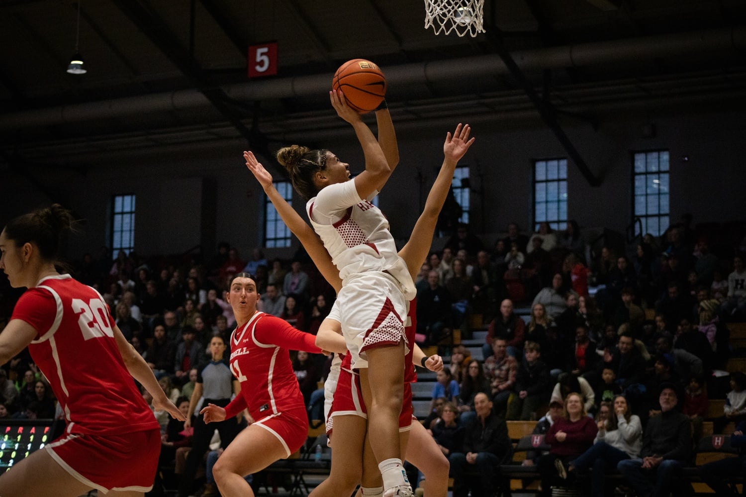 Jones finishes through contact for Harvard against Cornell.