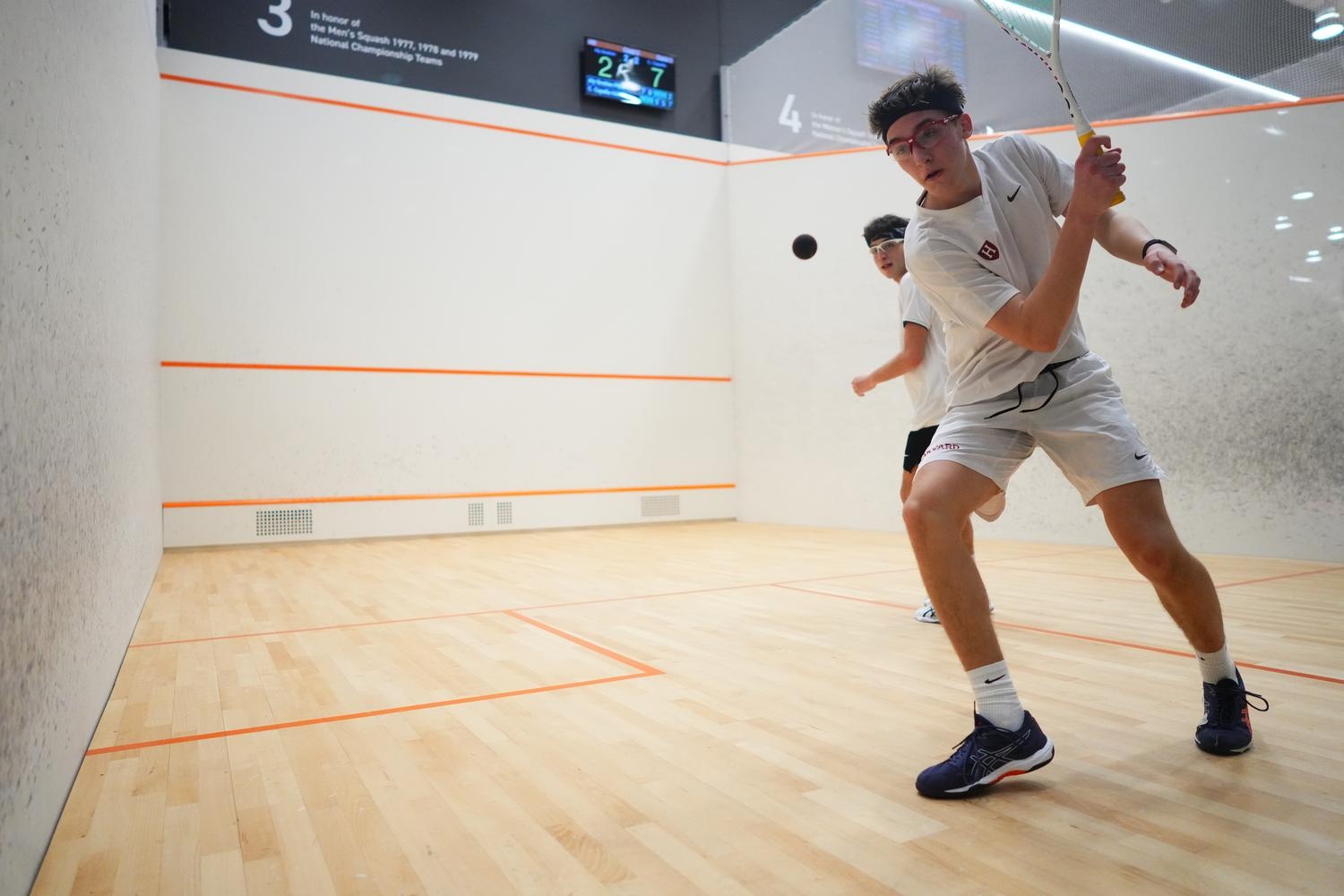 Capella focuses on the ball as he prepares to hit a backhanded shot.