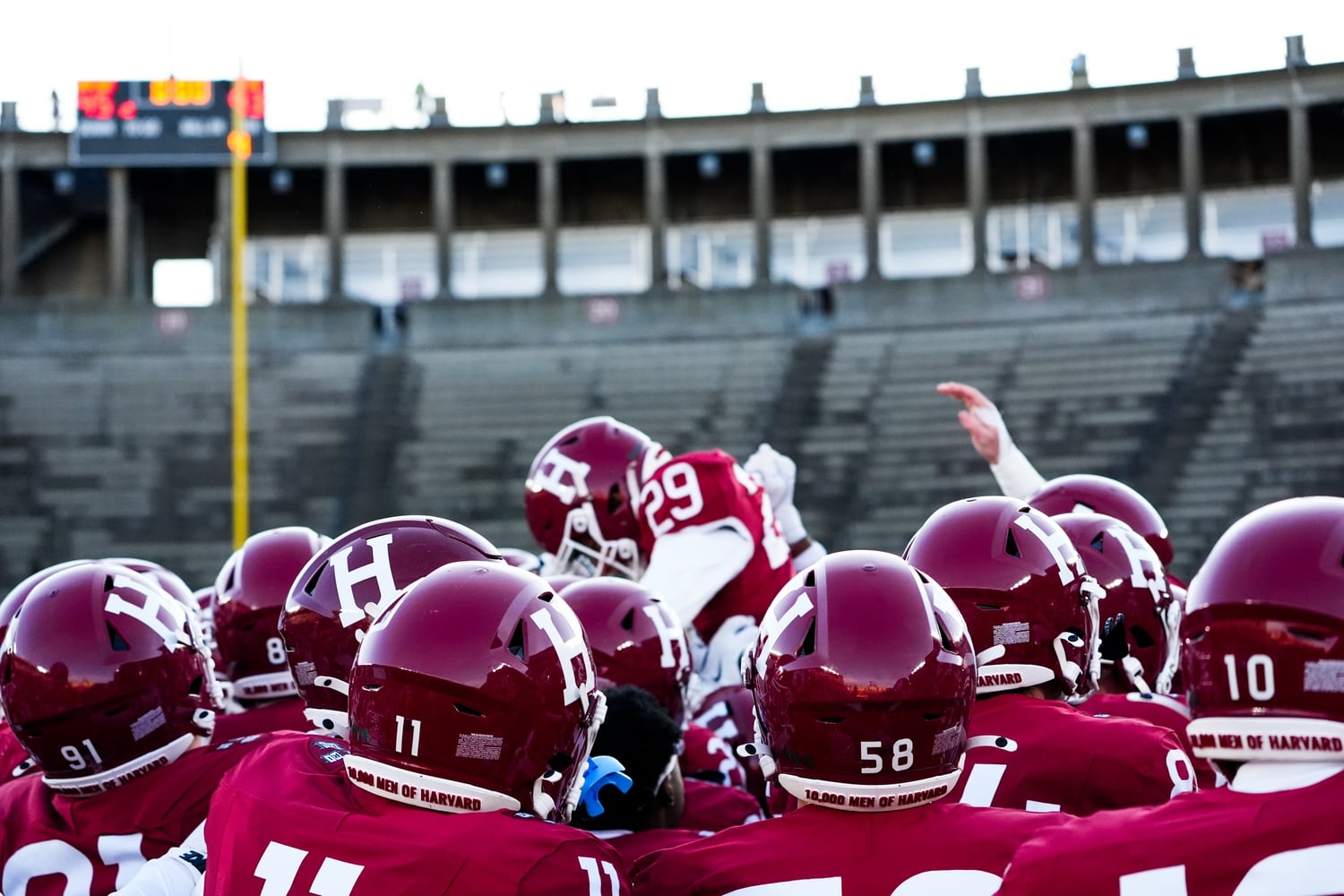 Corr is mobbed and lifted skyward as the team celebrates his game-winning kick against Penn.