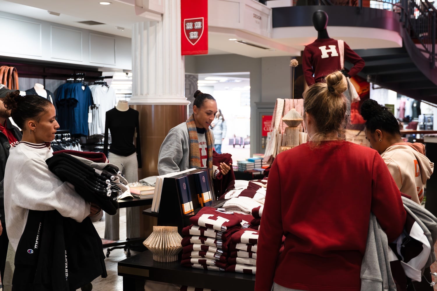 Ariel Gaston and Carrie Moore select outfits at The Coop.