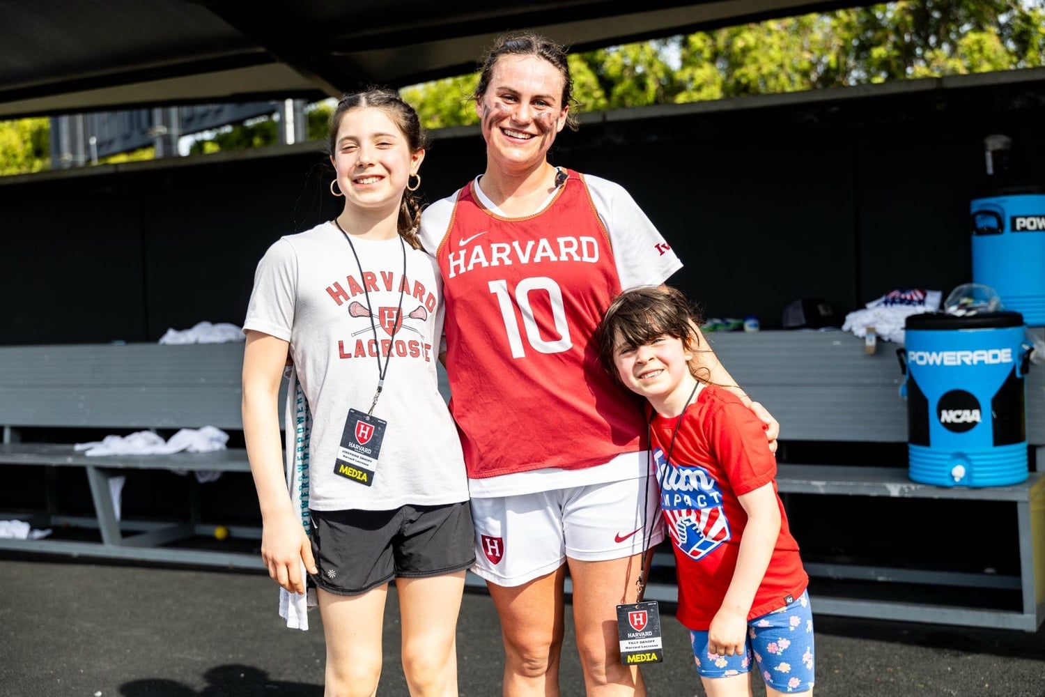 Grace Taylor '25 with her Team IMPACT teammate, Tilly, and her sister Josephine. 