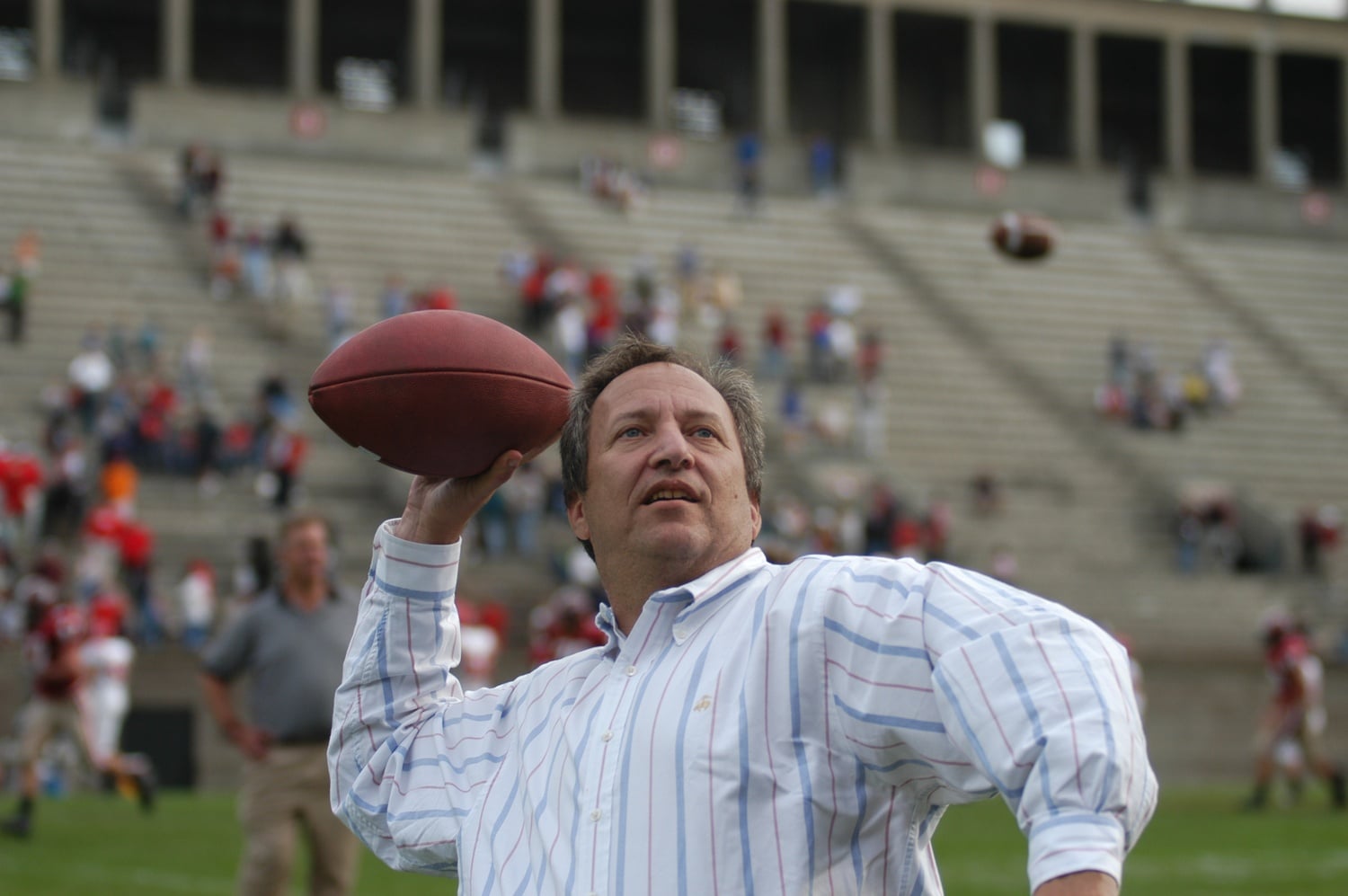 After his selection as Harvard president, Lawrence H. Summers made early efforts to connect with students. Summers and his son attended Harvard football's 34-24 win over Cornell at Harvard Stadium on Oct. 9, 2004.