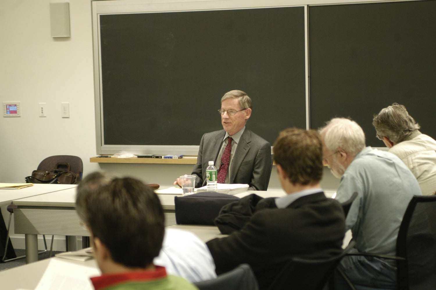 Harvey C. Mansfield '53 gives a seminar in the CGIS Knafel Building in the early 2000s.