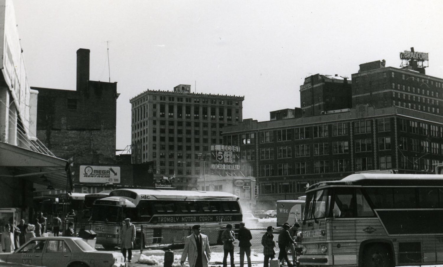 Buses sit at the Park Square bus depot, formerly the Trailways Bus Terminal, in the 1970s. As Boston's busing crisis unfolded, Harvard students confronted the city's racial violence.