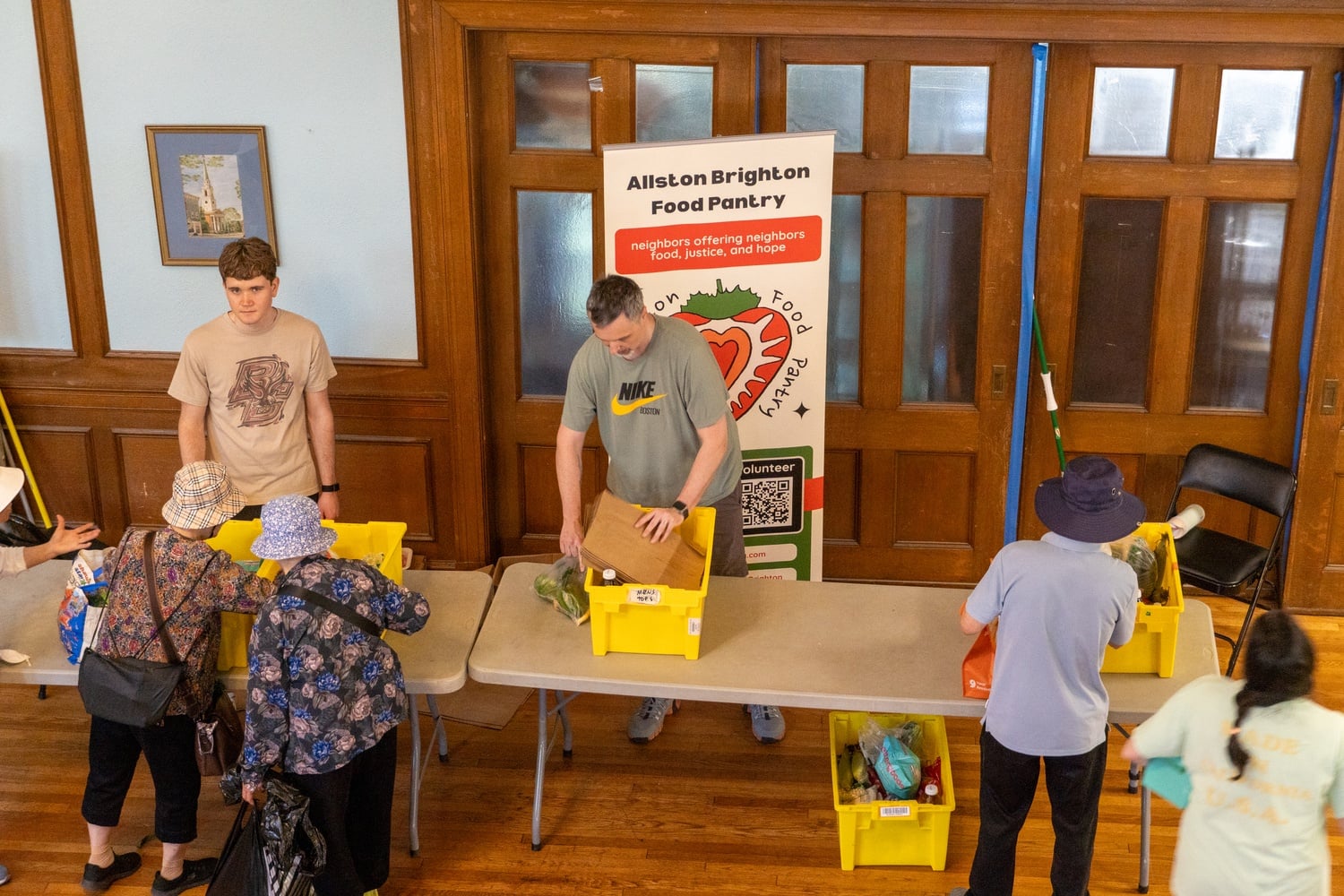 The Allston Brighton Food Pantry, located in the Brighton Allston Congregational Church, reopened its doors to the public for its first Saturday food distribution since snowstorm damage shut down operations in February.